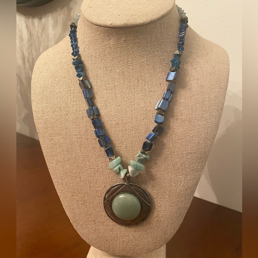 Light Blue-Green Stone Necklace With Silvertone And Light Green Pendant.